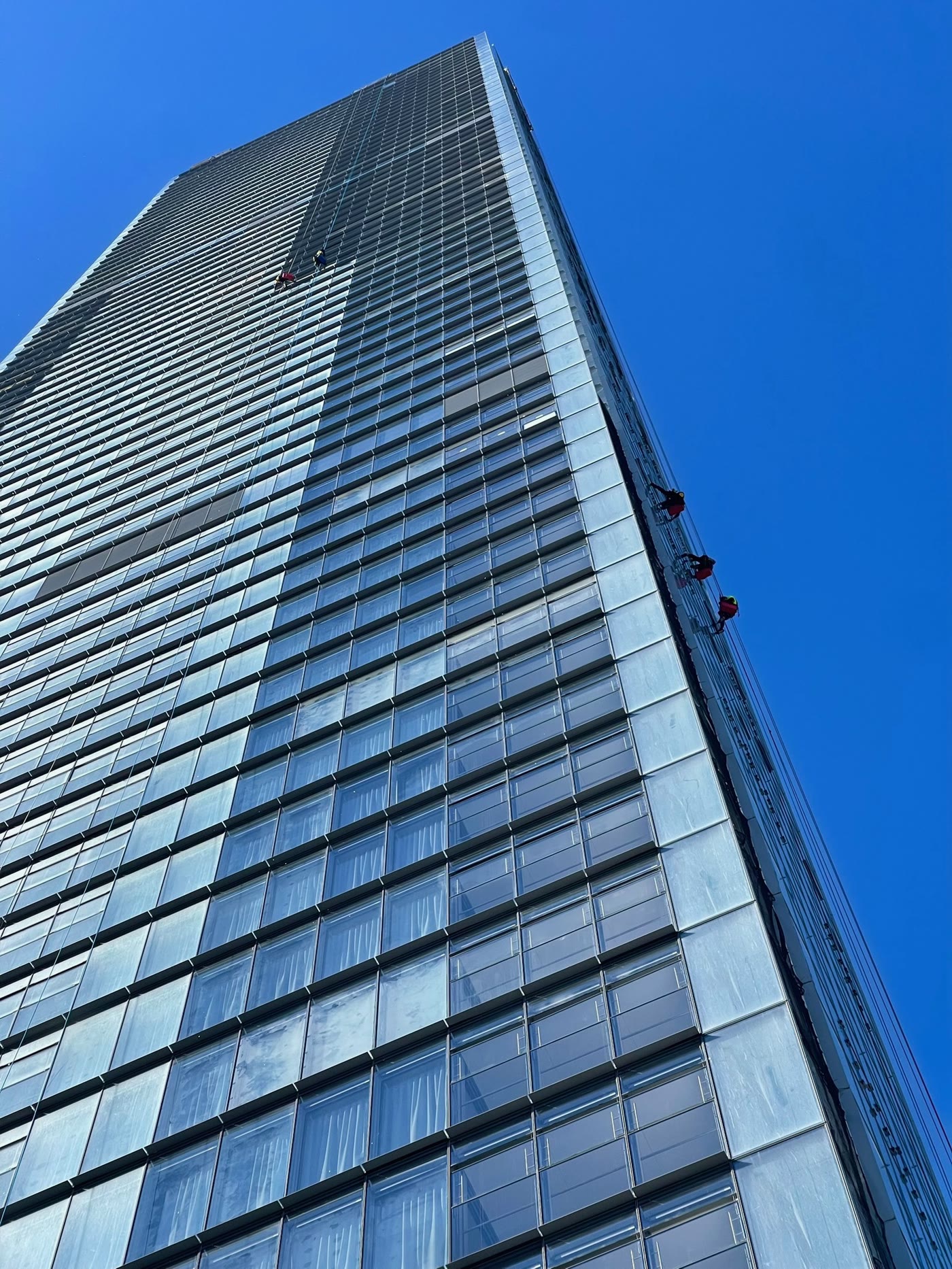 Glass tower façade from below
