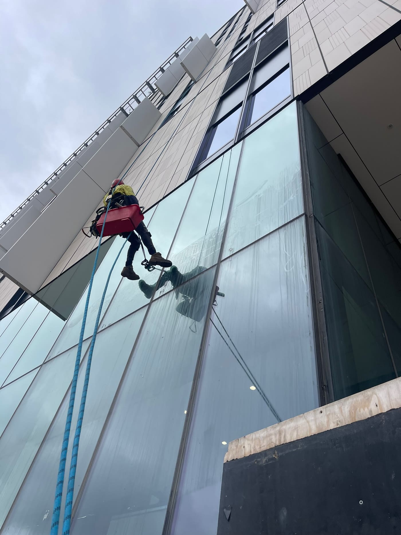 Rope access on a modern façade